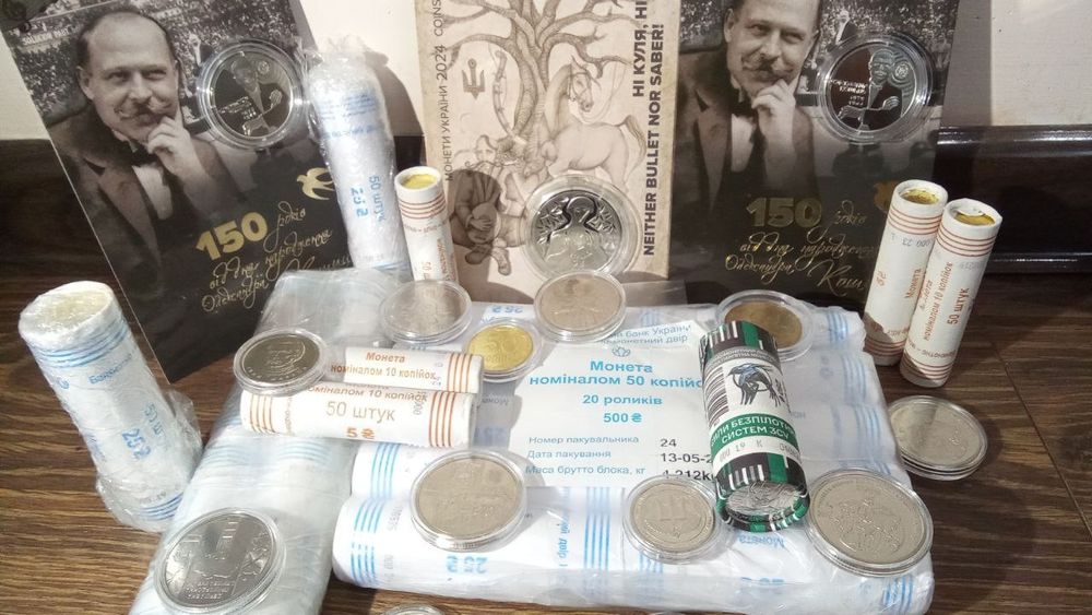 Монети НБУ у капсулах ролах блістерах