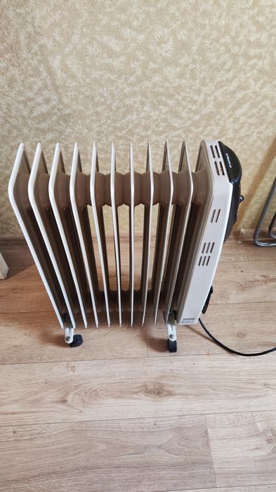 Продам маслянный обогреватель Delfa