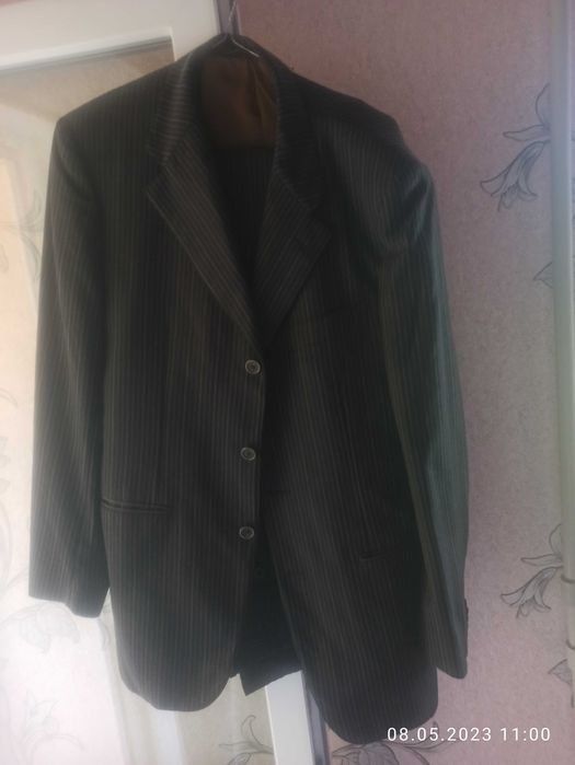 продам мужские костюмы