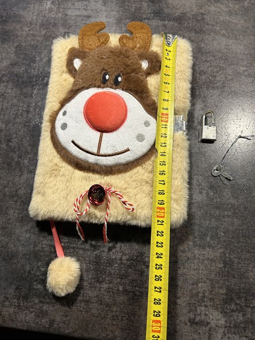 Puchaty notesik z reniferkiem, klodka