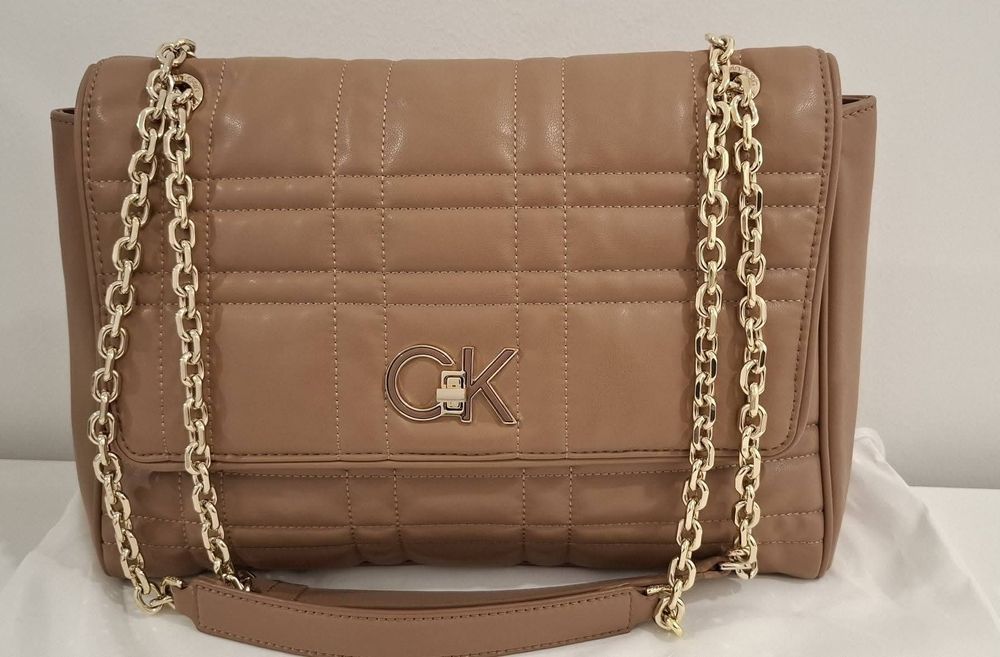 Mala +Carteira  Calvin Klein originais e novaa