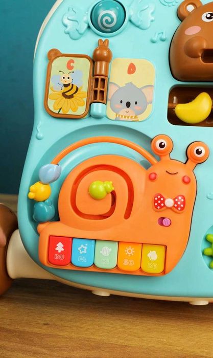 Ходунки-каталка та інтерактивний розвиваючий столик-бізіборд 3 в 1