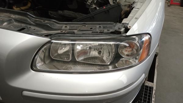 Ótica / farol esquerda VOLVO S60 I (384)