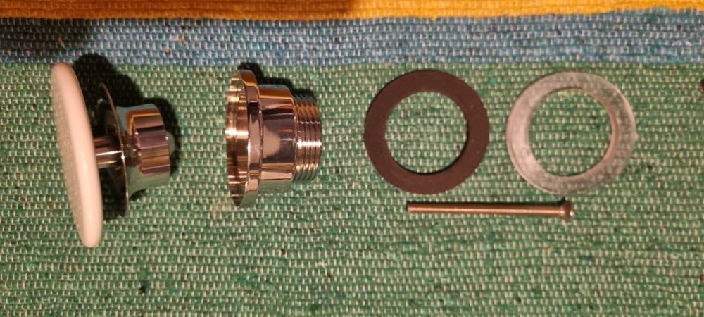 LAUFEN korek ceramiczny automatyczny do umywalki BIAŁY