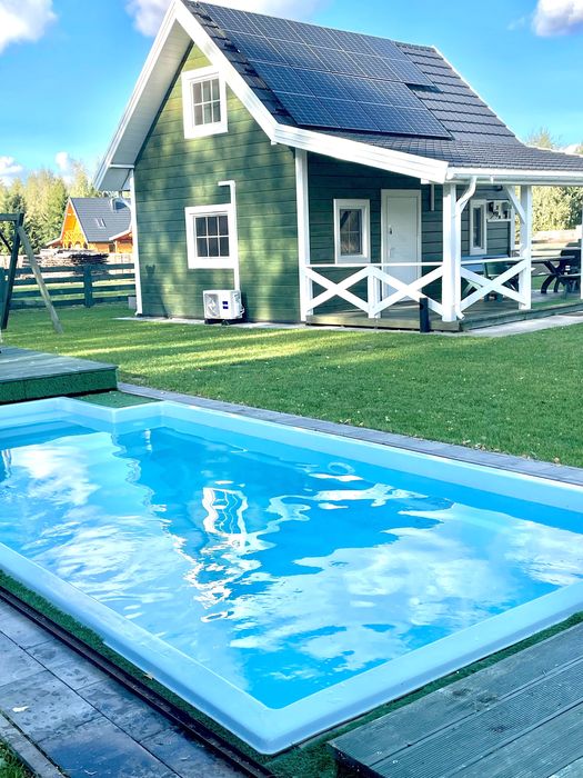 Zielony domek 12 osób Pilchy Roś basen sauna Mazury wynajem