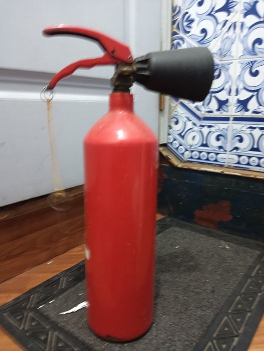 Extintor usado de pó