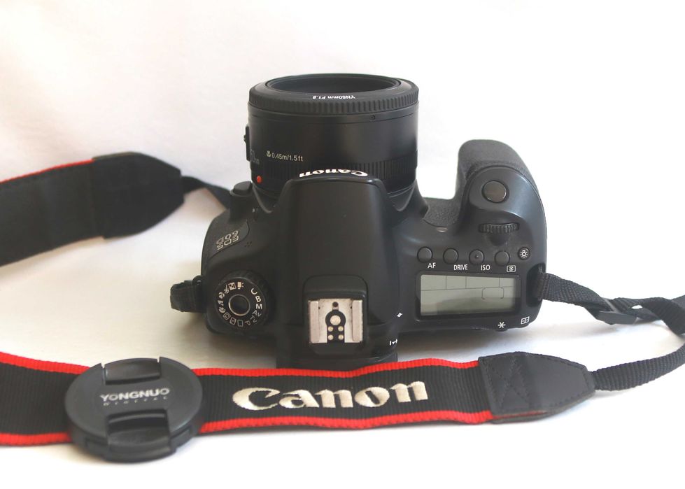 Canon 60D e lente Yongnuo 50 f\1.8 máquina fotográfica digital reflex