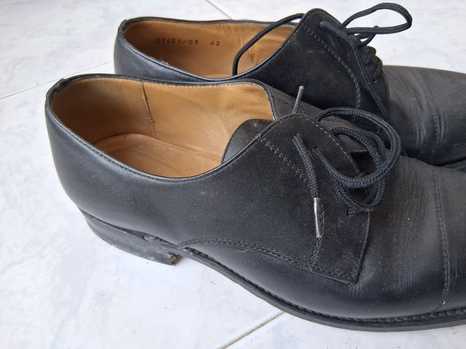 Sapatos derby de homem em pele