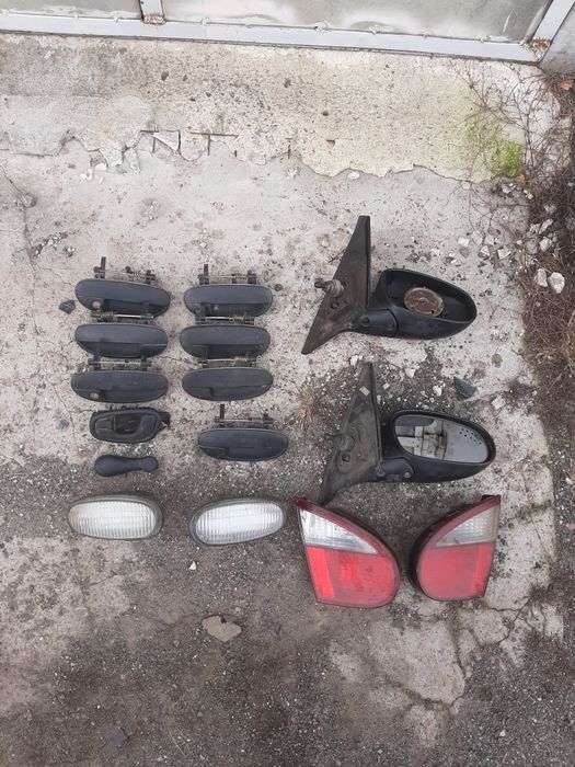 Дверні ручки, дзеркала заднього виду, стопи на Daewoo Lanos