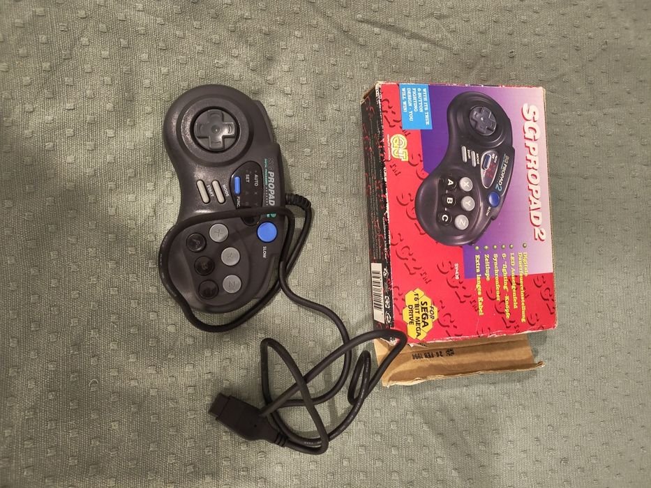 Comando Mega Drive em caixa