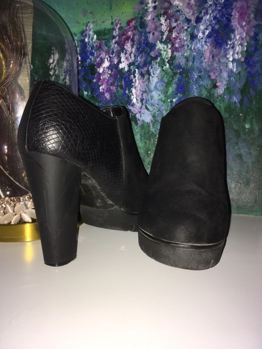 Botas pretas salto alto