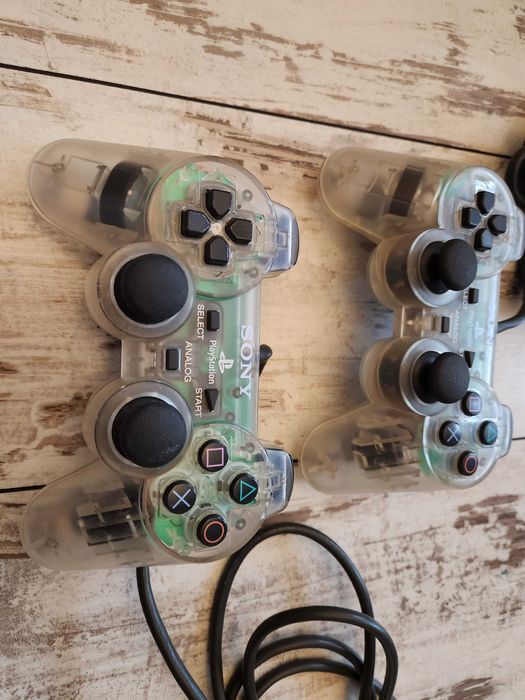 Dwa pady Dualshock PS1 Playstation przezroczyste Crystal