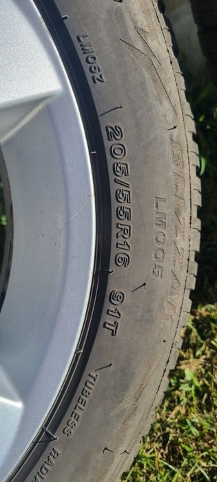 Felgi aluminiowe Mazda + 4 opony zimowe Bridgestone
