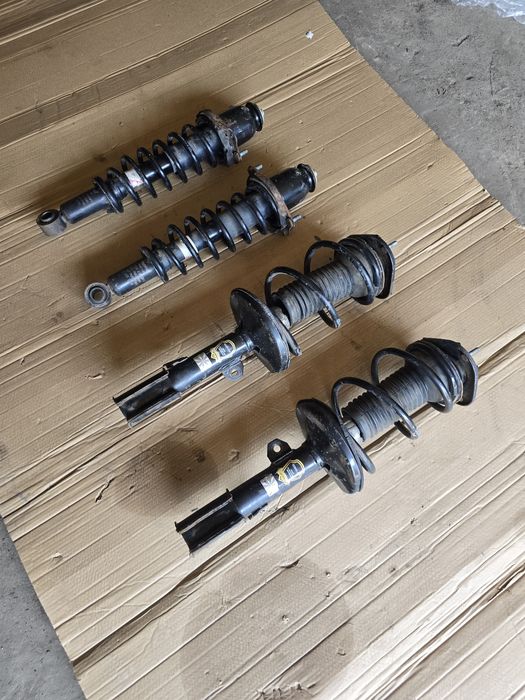 Стойки в сборе Toyota Corolla E12 Verso передние задние Тойота Королла