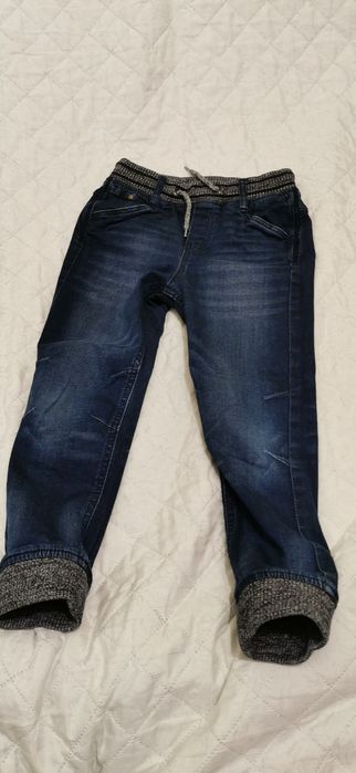 Jeansowe spodnie 122 stan idealny