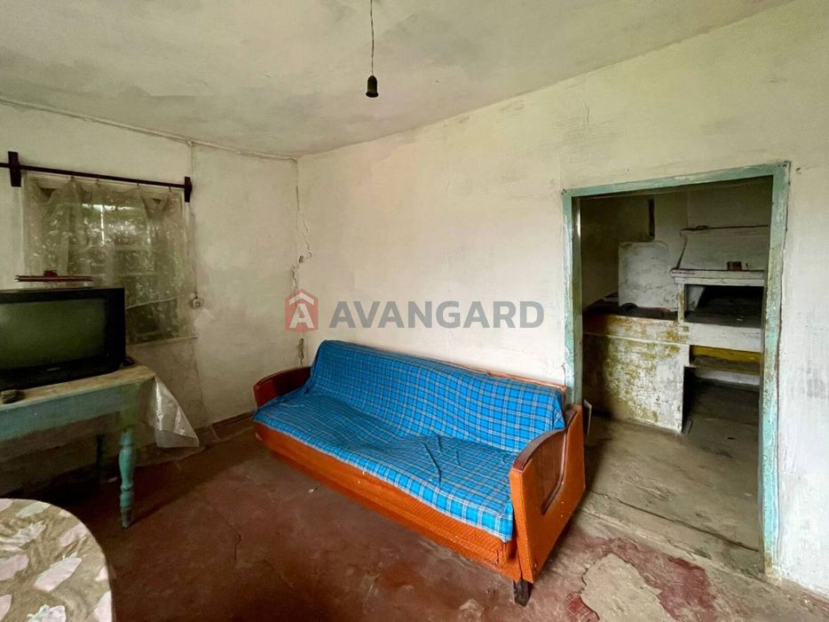 Ділянка 25 сотих з будинком в с. Худяки