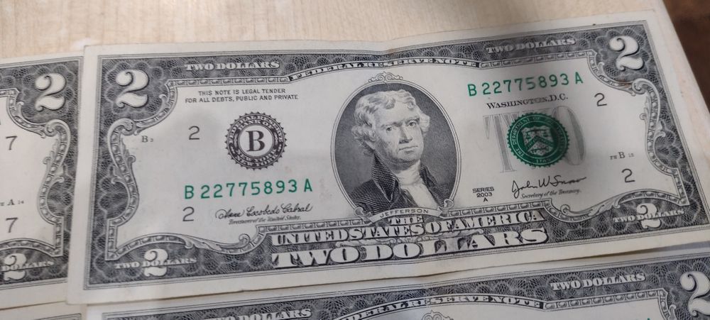 Продаж купюри 2 долара 2013; 2017  та 1  долар  2009.,2017