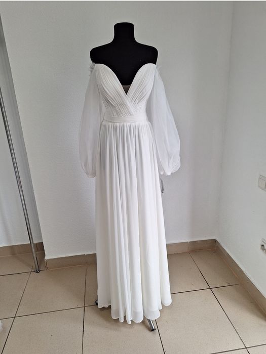 Продам нові весільні плаття