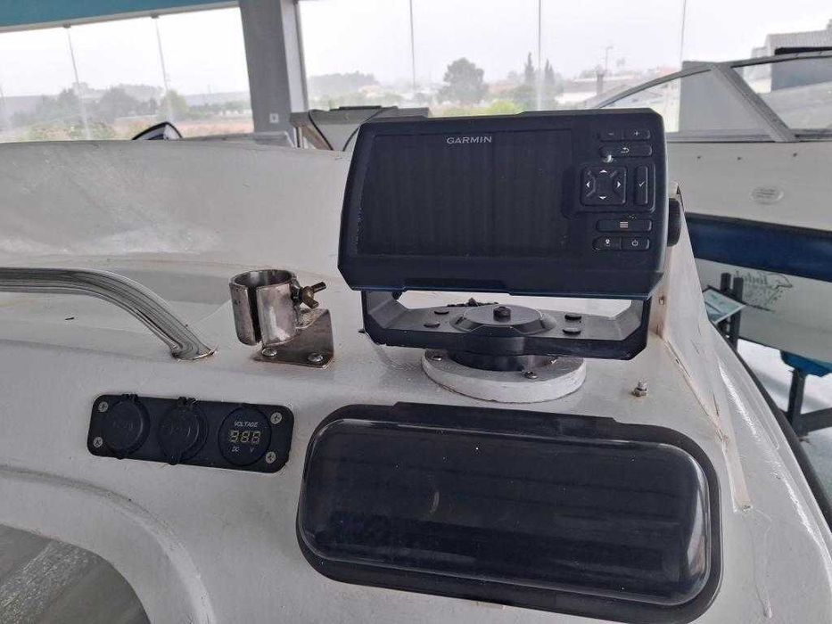 Barco OBE 4.70 com o motor TOHATSU 25HP  com trime 4T.