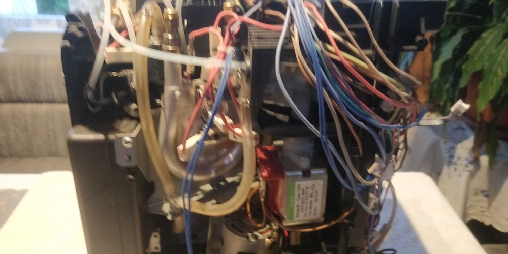 Delonghi esam 6900 część kadłubek grzałki winda pompa młynek co na zdj