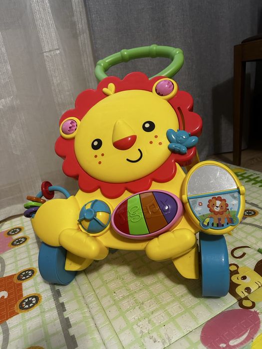 Іграшка Fisher-Price Ходунки - штовхач музичний