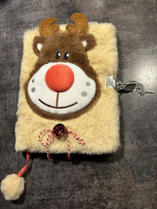 Puchaty notesik z reniferkiem, klodka