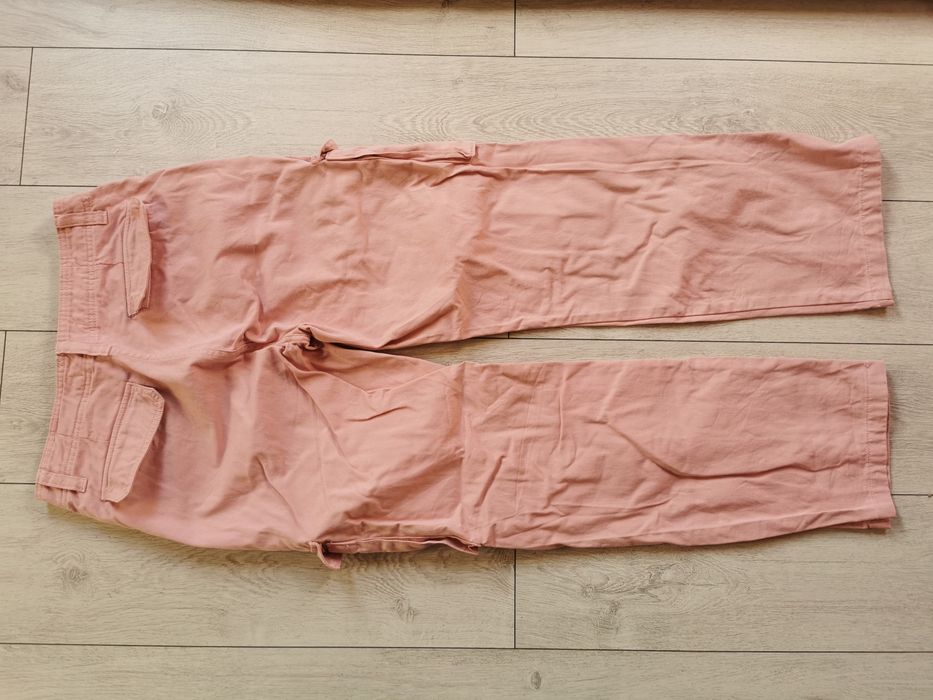 Szerokie spodnie różowe damskie 38 Stradivarius