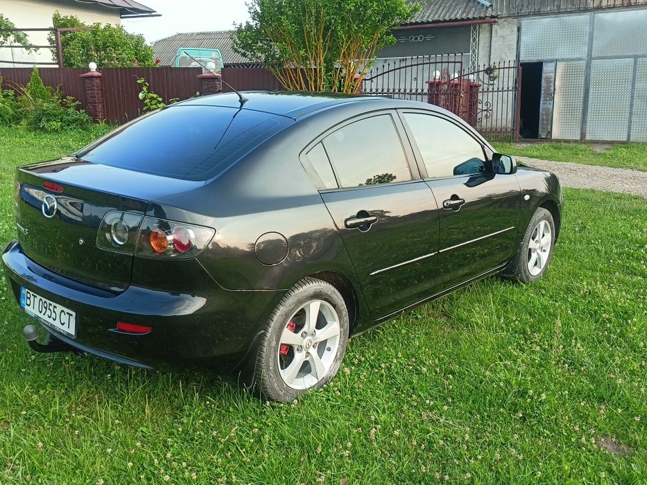Мазда 3.2006 року