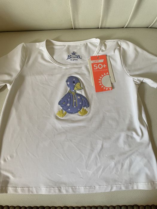 Tshirt com proteção solar tamanho 4 nova