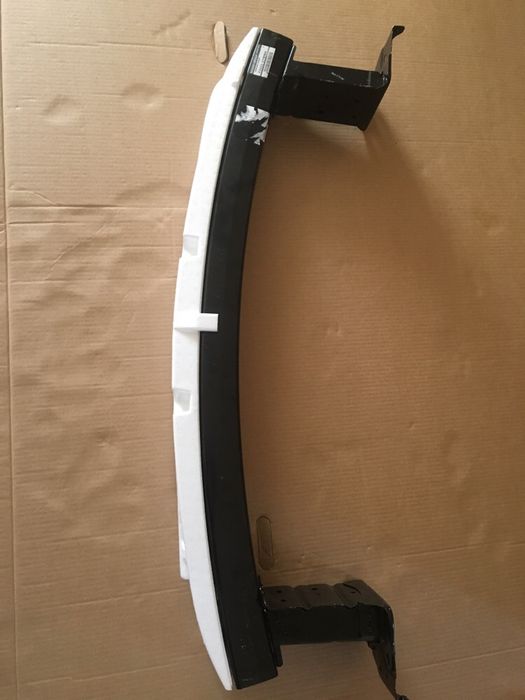 Передний усилитель бампера USA новый в оригинале на NISSAN JUKE рест