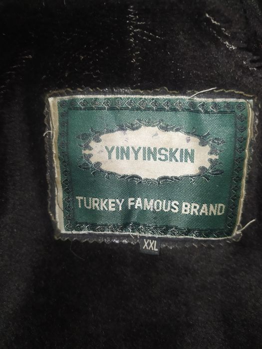 Пальто шкіряне довге.