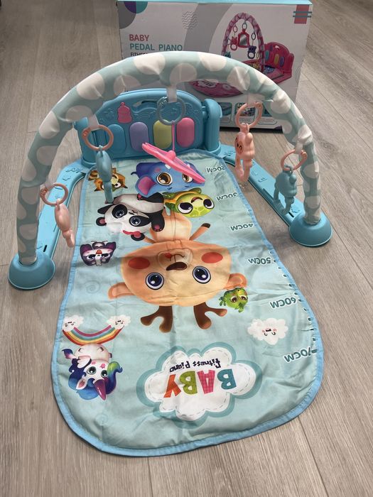 Продам розвиваючий килимок з піаніно.
