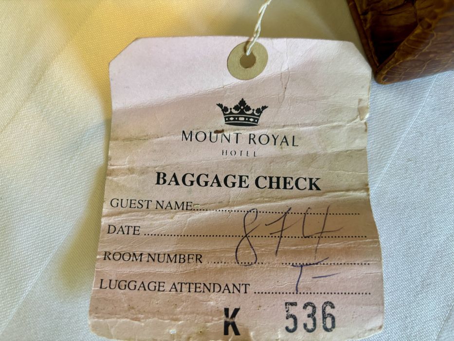 Mala em pele de crocodilo verdadeira