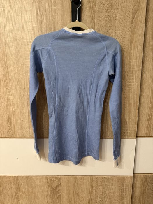 Bluzka Helly Hansen S 57% merino wool wełna termo narty baby blue