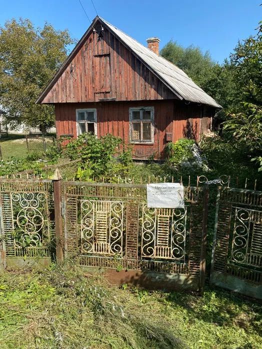 Будинок з ділянкою в с. Бучали