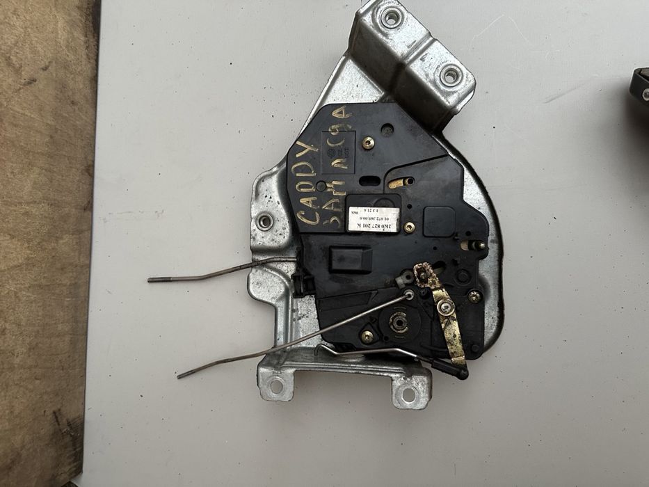 Замок бокових зсувних дверей ляди кришки багажника VW Caddy Кадді