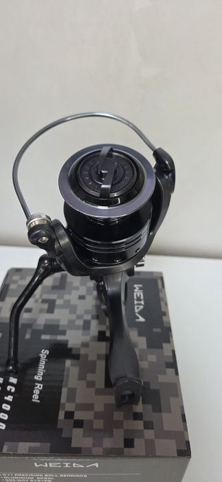 Катушка рыболовная с байтранером Weida XC 5000 и 6000 ( 5+1 bb)