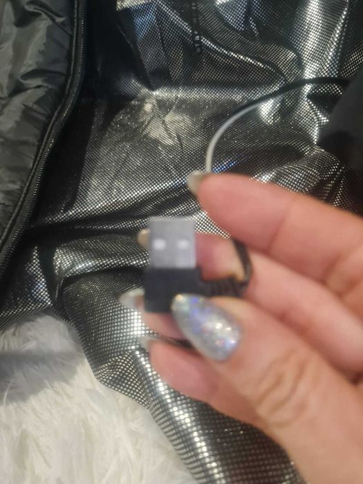 Casaco de aquecimento recarregável