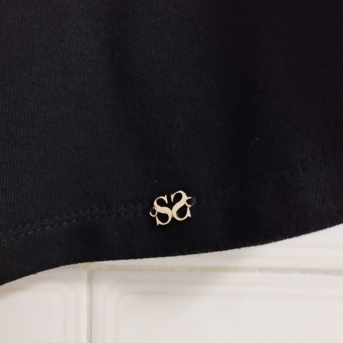Camisola de marca SCUSI