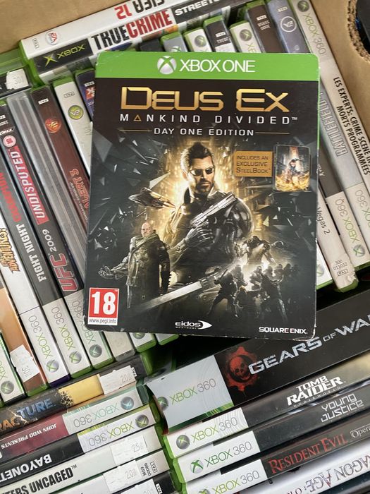 Gra Deus Ex Mankind Divided Xbox One Series X pudełkowa