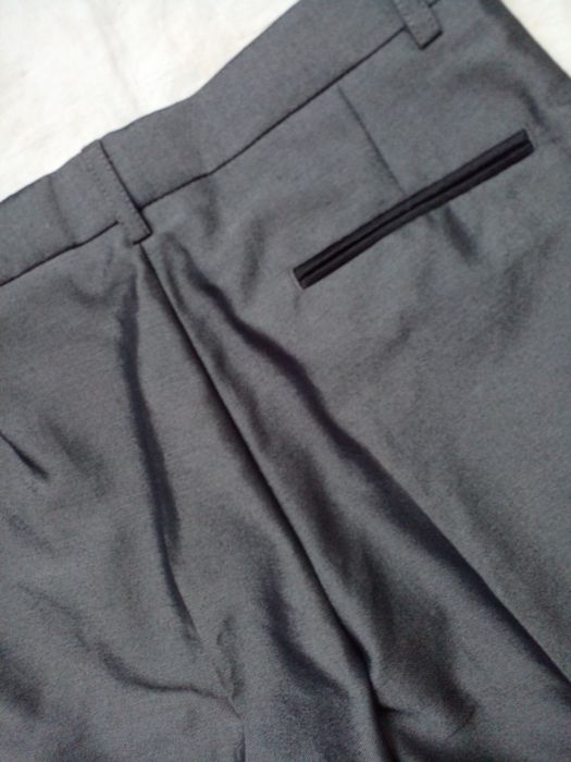 Брюки на хлопчика 11 років