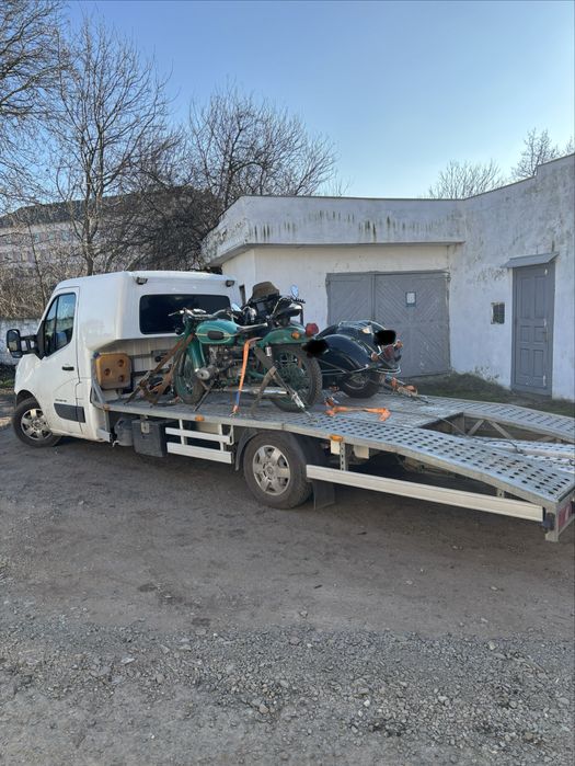 Послуги евакуатора, перевезення авто, мото, вантажі,допомога в дорозі