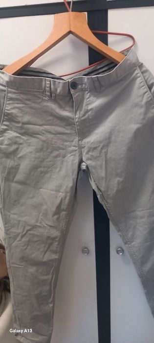 Firmowe spodnie męskie. Szare