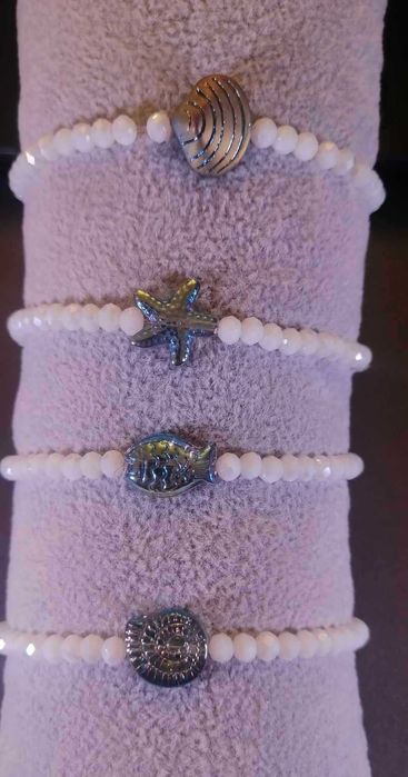 Pulseira cristal vidro facetado branco com caracol mar - Nova