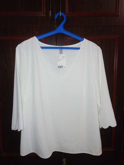 Блузка нарядна білого кольору