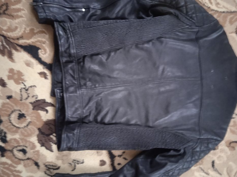 Мото куртка шкіряна.