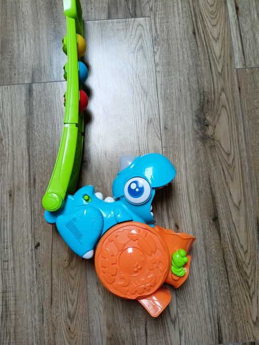Dinozaur pchacz z piłeczkami