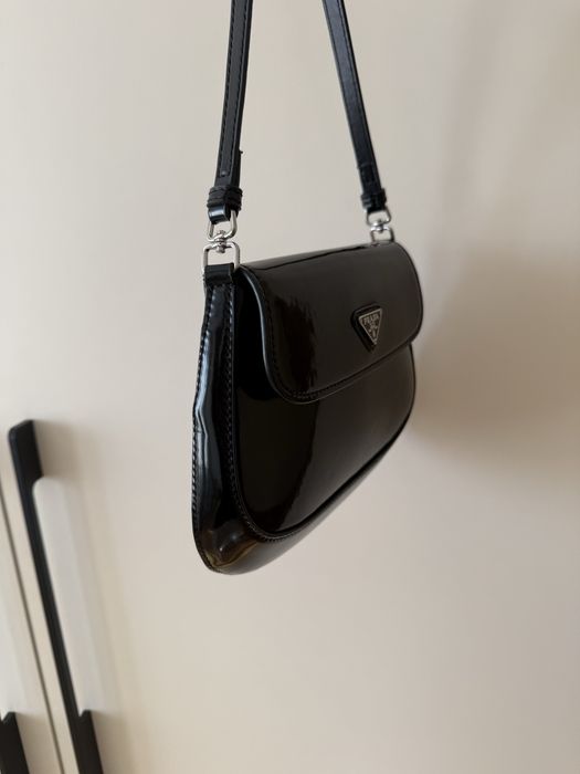 Prada.         burberry