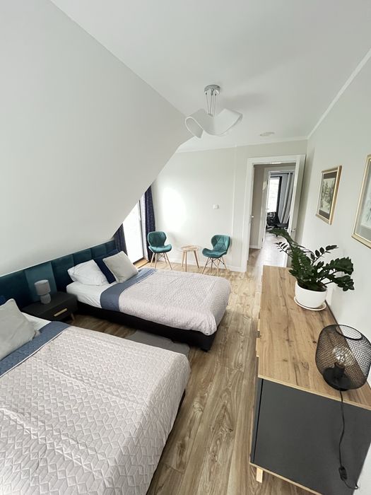 Domek Bielik z jakuzzi  nad jeziorem w Lubniewicach