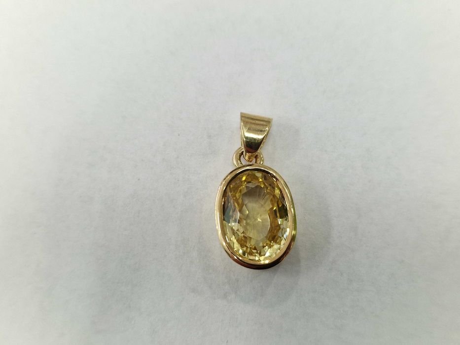 Złoty wisiorek/ 750/ 7.27 gram/ Chryzoberyl 7.40 CT/ wycena